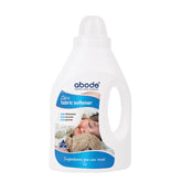 A white plastic 1 litre bottle with a handle incorporated in the bottle. The bottleis labelled Abode Fabric Softener (Front & Top Loader) Zero 1L