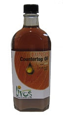 A small 250ml glass bottle labelled Kunos Countertop Oil 